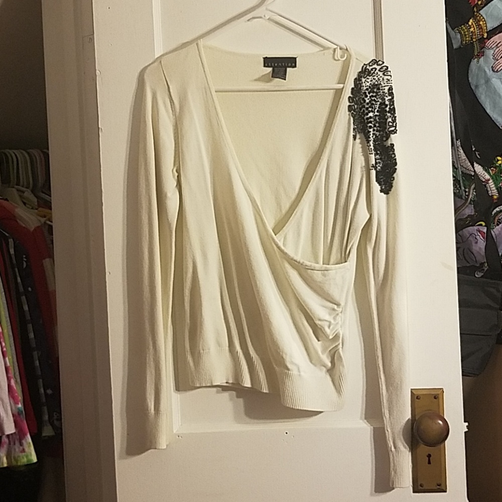 White long sleeve sweater with black beading
